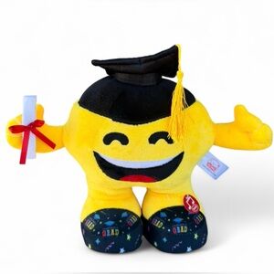 Graduation Emoji Plush toy that features sound and lighting capabilities.